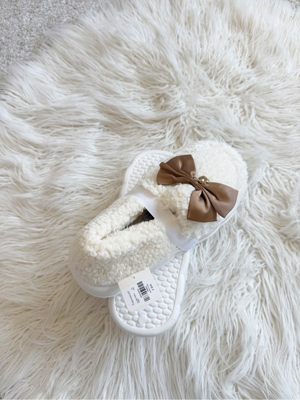Cozy Cream Sherpa Slippers with Brown Bow